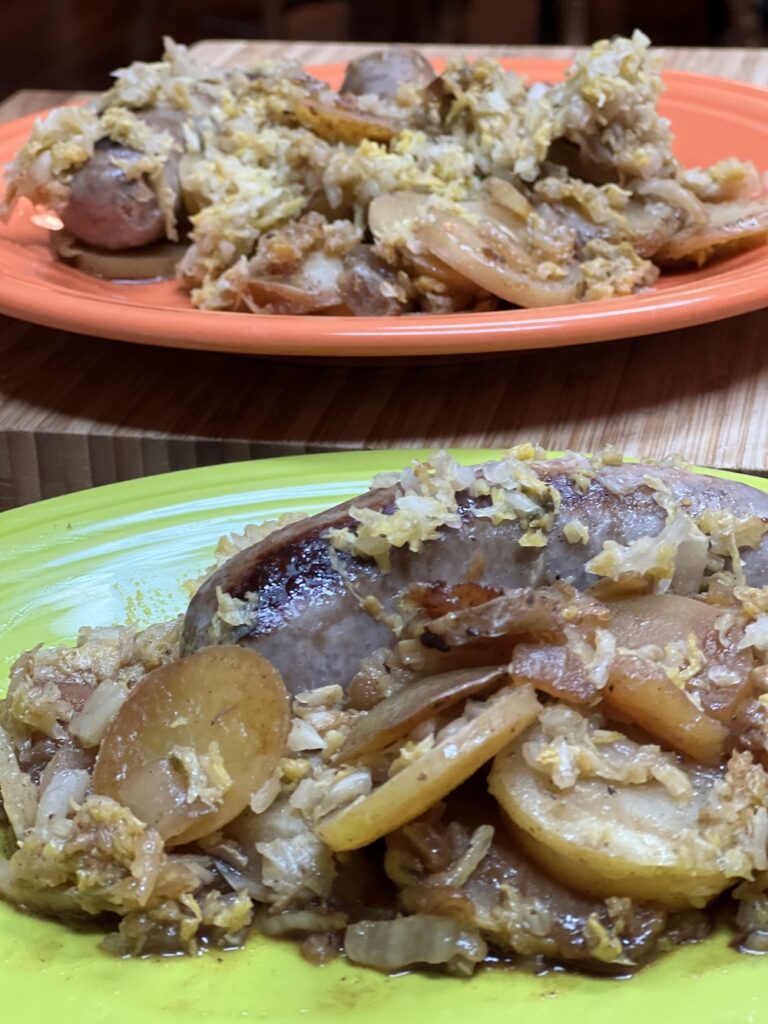 Bratwurst with potatoes and Sauerkraut